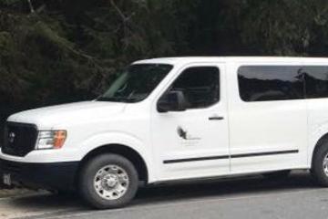 a van parked on the side of a road